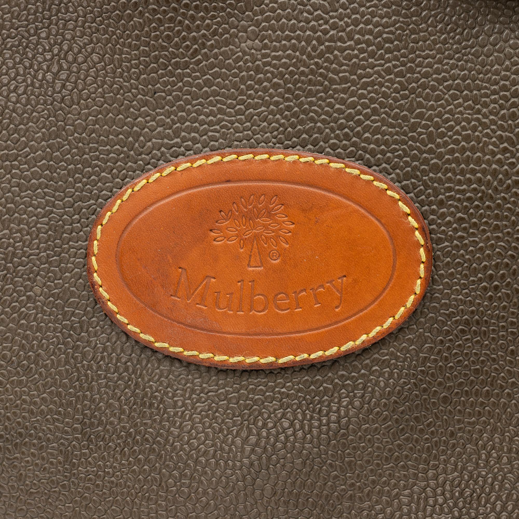 Mulberry, a scotch grain suitcase.
