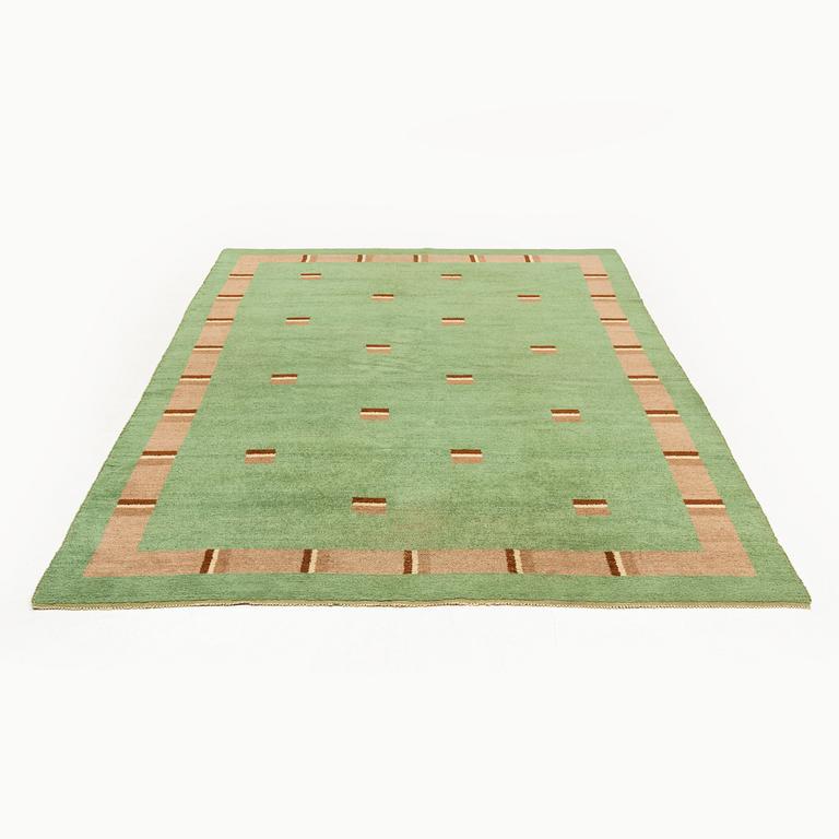A pile carpet, c. 356 x 244 cm.