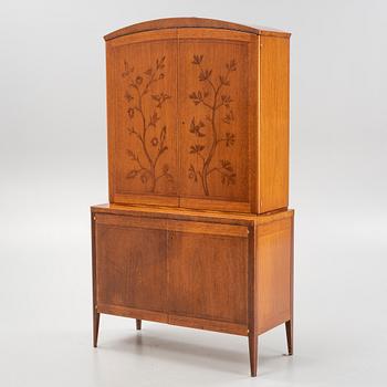 A mahogany veneered cabinet, Westbergs Möbler AB i Tranås, mid 20th Century.