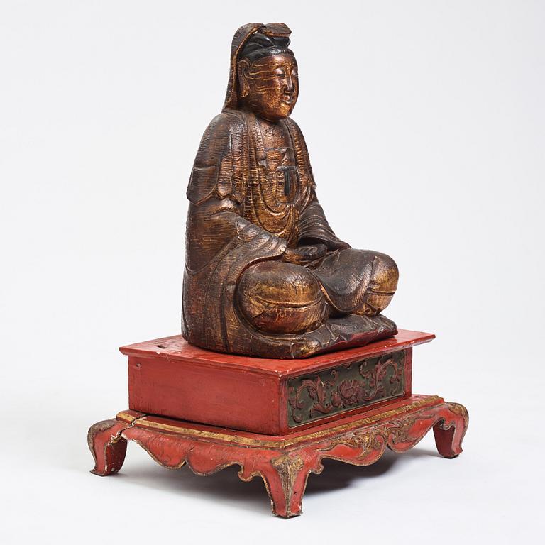 A large wooden gilt lacquer figure of Guanyin, Vietnamese/Southern China, about 1800 or later.