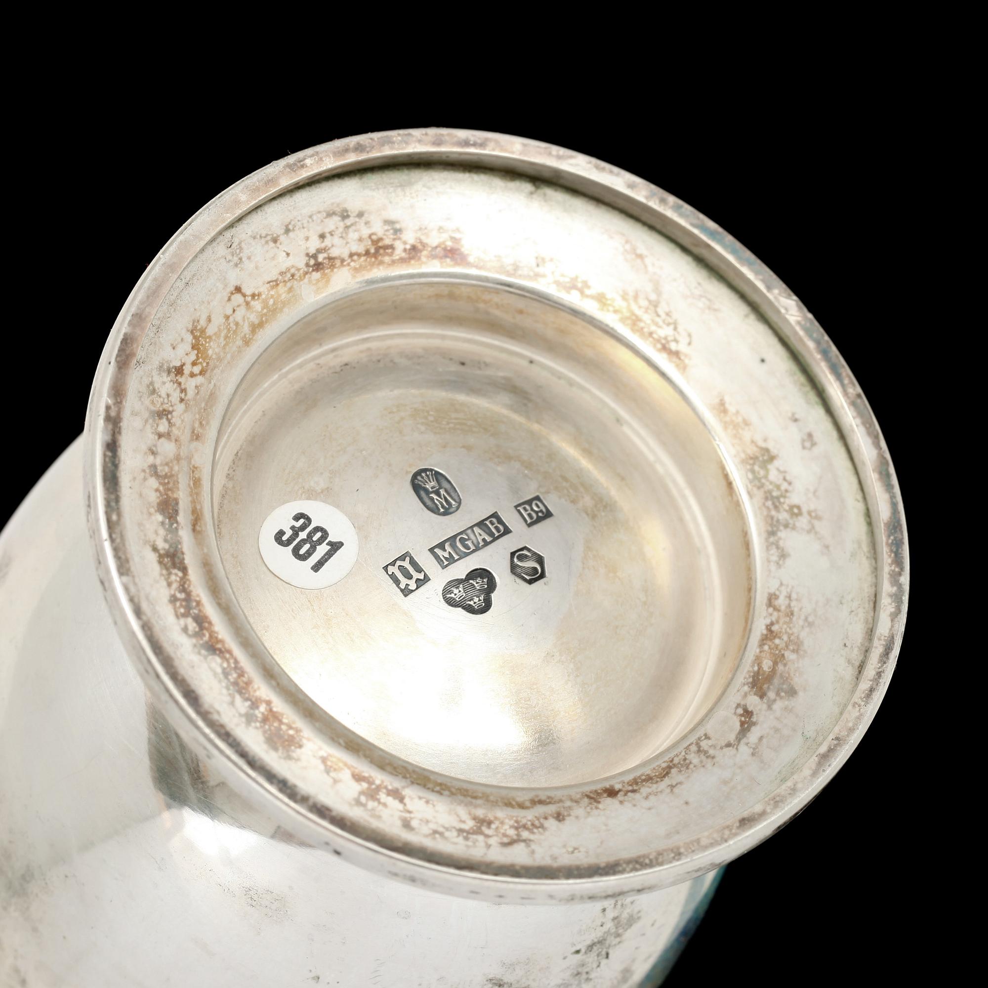 VAS och FAT, silver, MGAB, Uppsala 1952 resp B Erlandsson, Kristianstad 1909.