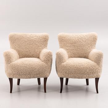 A pair of Swedish Modern armchairs, mid 20th century.