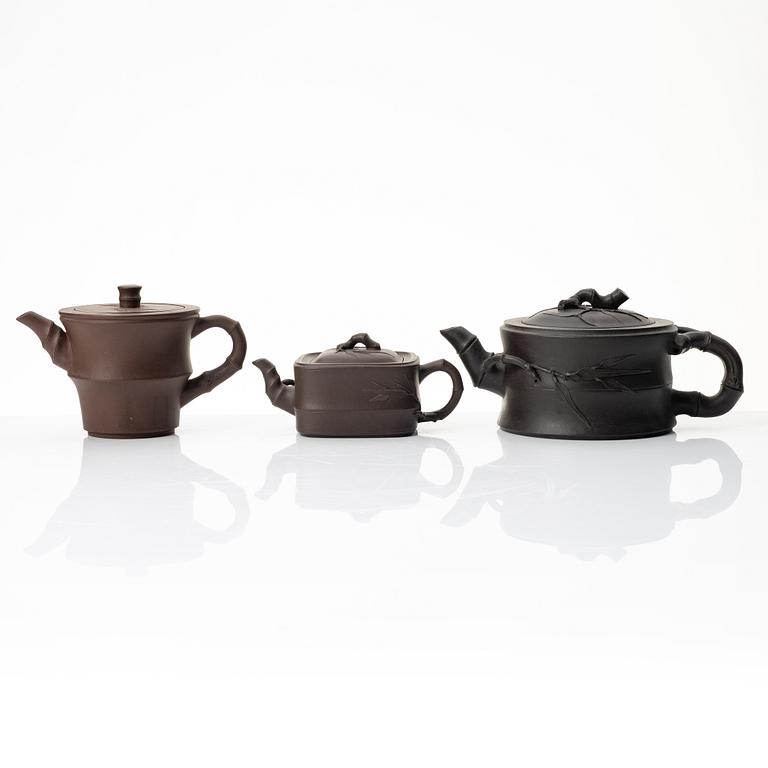 A group of Chinese yixing teapots, 1980s.