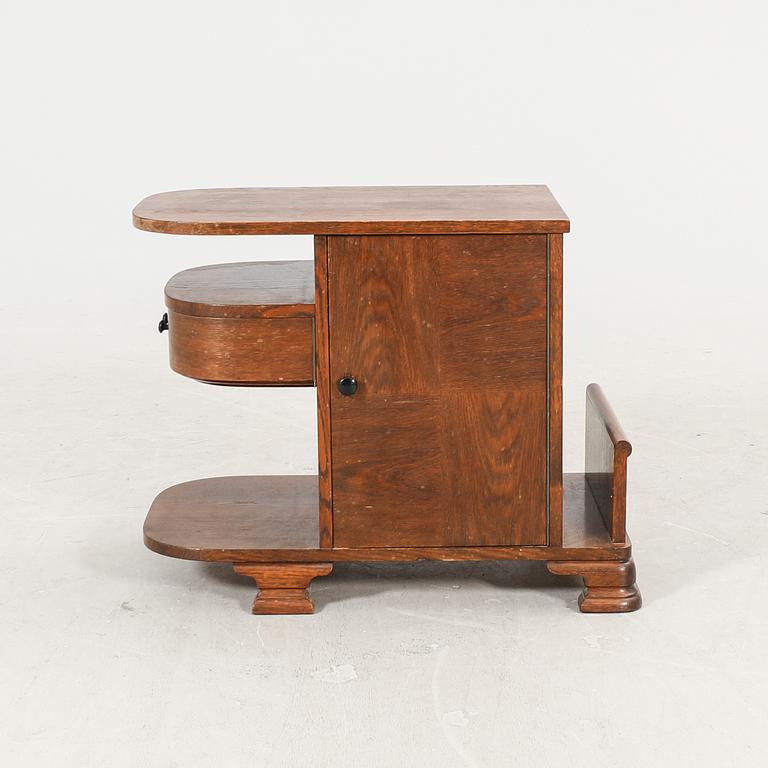 An Art Deco oak side table first half of the 20th century.