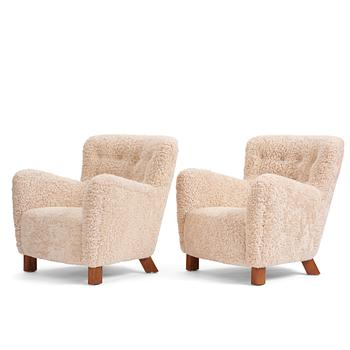 Fritz Hansen, a pair of easy chairs model '1669', Denmark 1940-50s.