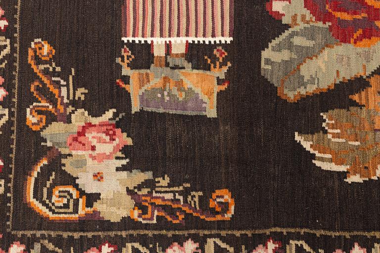 A Kelim carpet, Moldova, dated 1939, circa 385 x 174 cm.