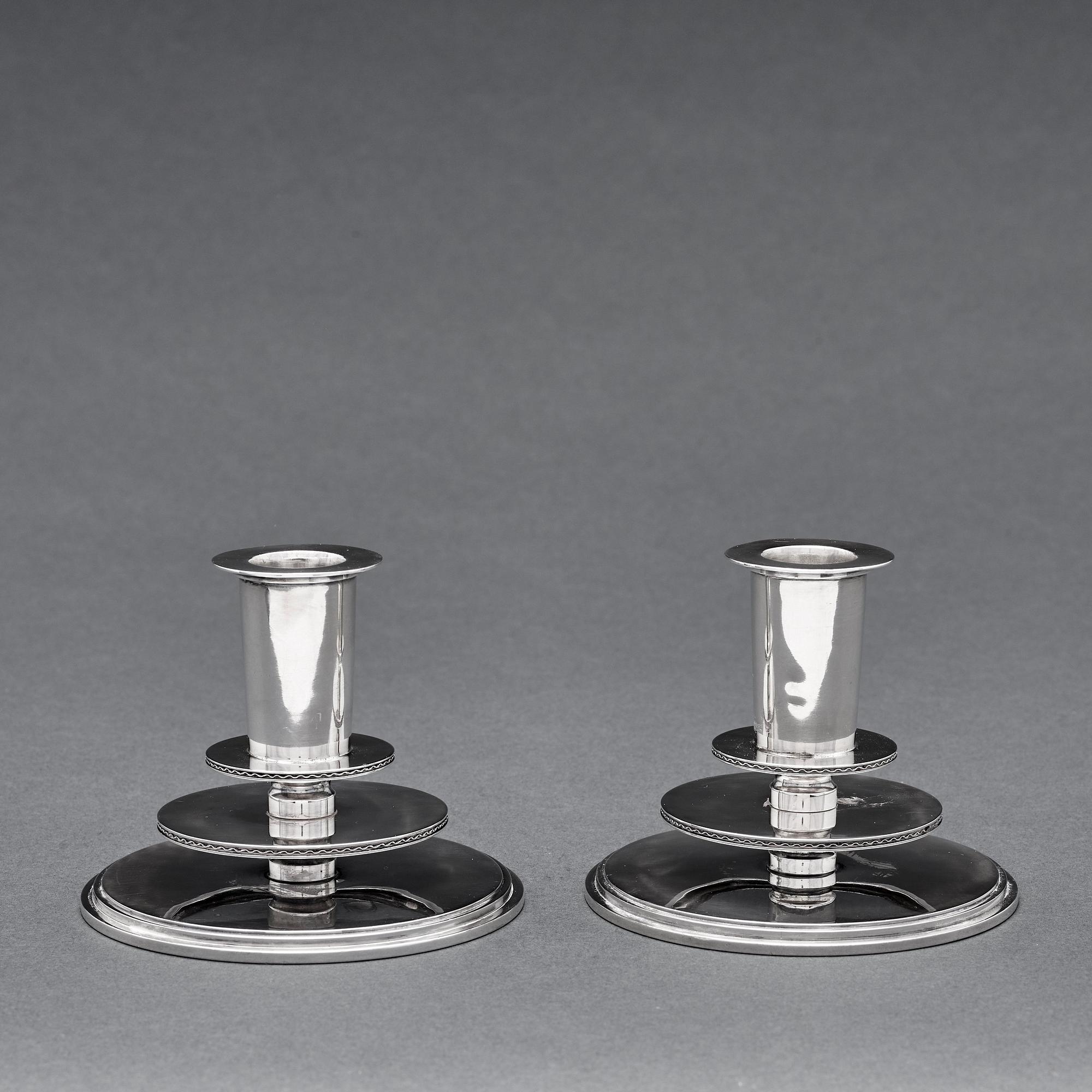 Atelier Borgila, a pair of sterling candlesticks, Stockholm, 1935.