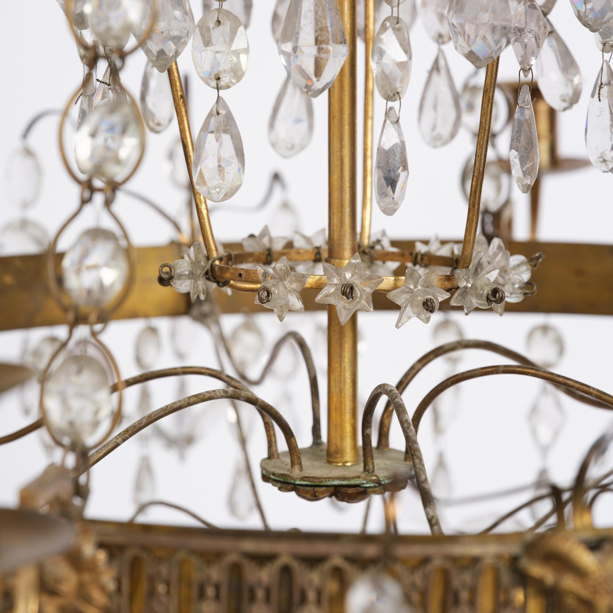 A Late gustavian green top glass six light chandelier.