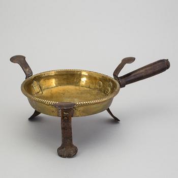 An 18th century brass brazier.