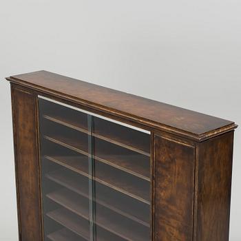 A stained birch bookcase from Nordiska Kompaniet, 1929.