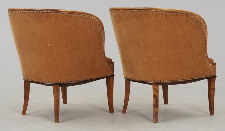 A pair of Nordiska Kompaniet 'Bellman' elm armchairs attributed to Axel Einar Hjorth, Sweden 1929-30.