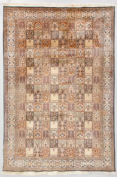 A silk carpet, approximately 267 x 182 cm.