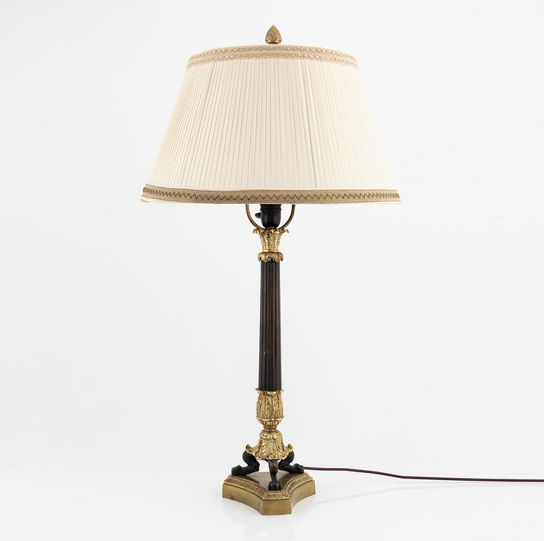 An Empire style brass table lamp, 20th Century.