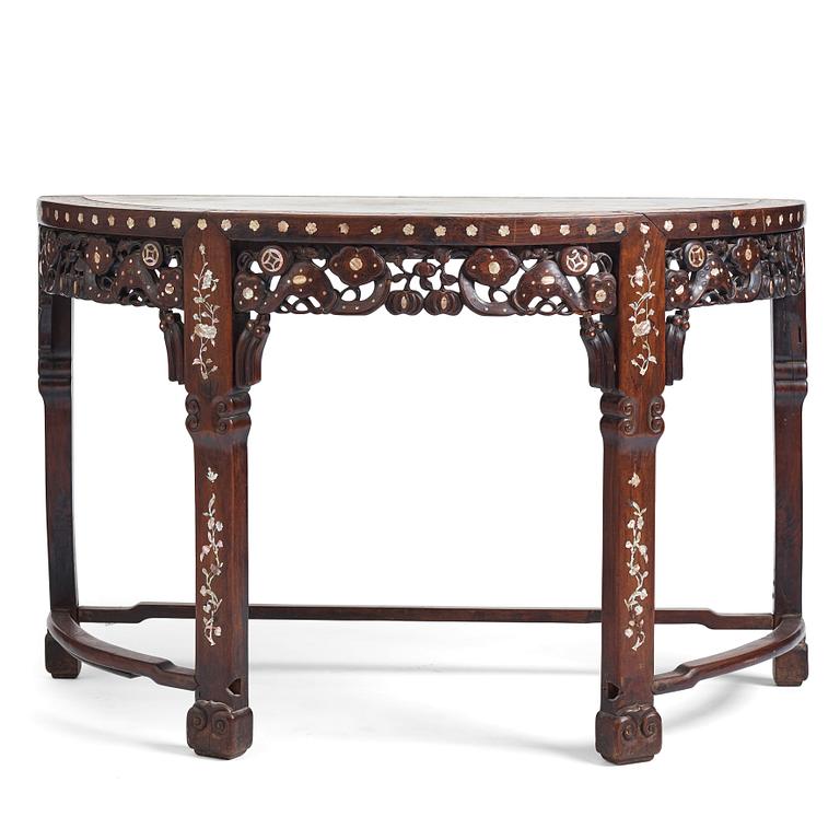 A Chinese hardwood demi-lune side table with mother-of-pearl inlays, late Qing dynasty.