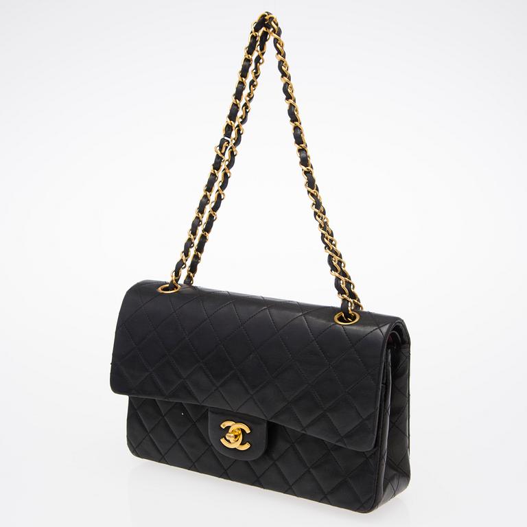 A Black Double Flap Bag.