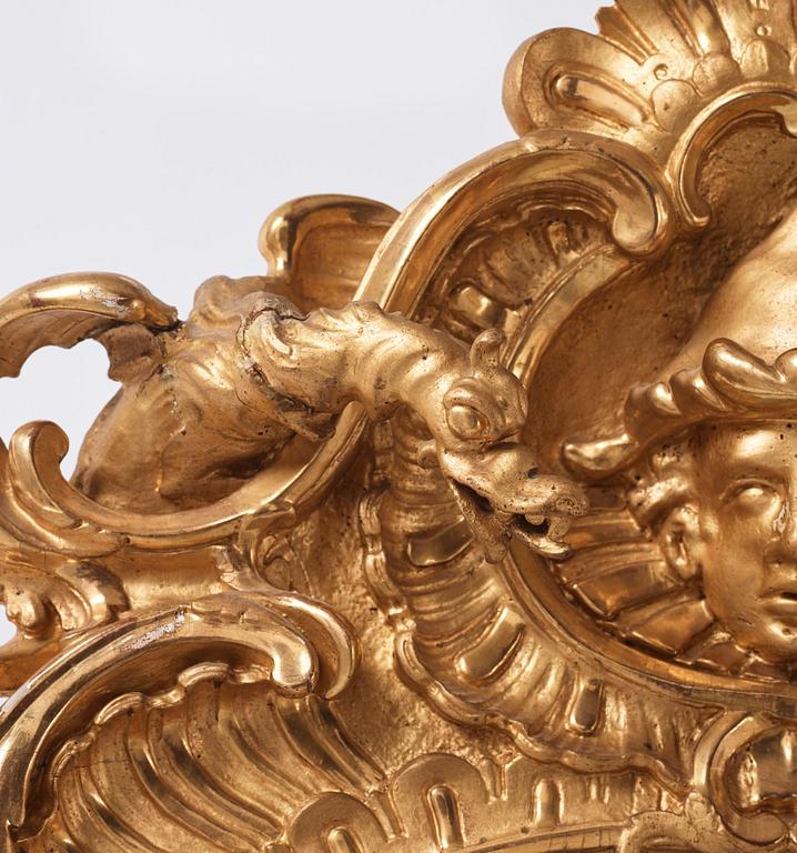 A Rococo dragon mirror.