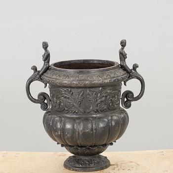 A IRON GARDEN URN.