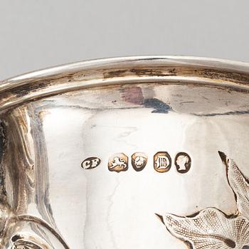 A parcel-gilt Rococo Revival silver jug, mark of Charles Fox II, London 1839.