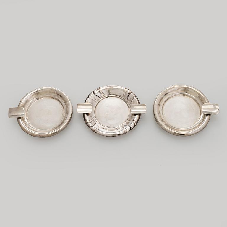 A silver cigarette case, matchbox holder and small bowl, Sandrik, as well as 3 ashtrays, Czechoslovakia 1929-1945.