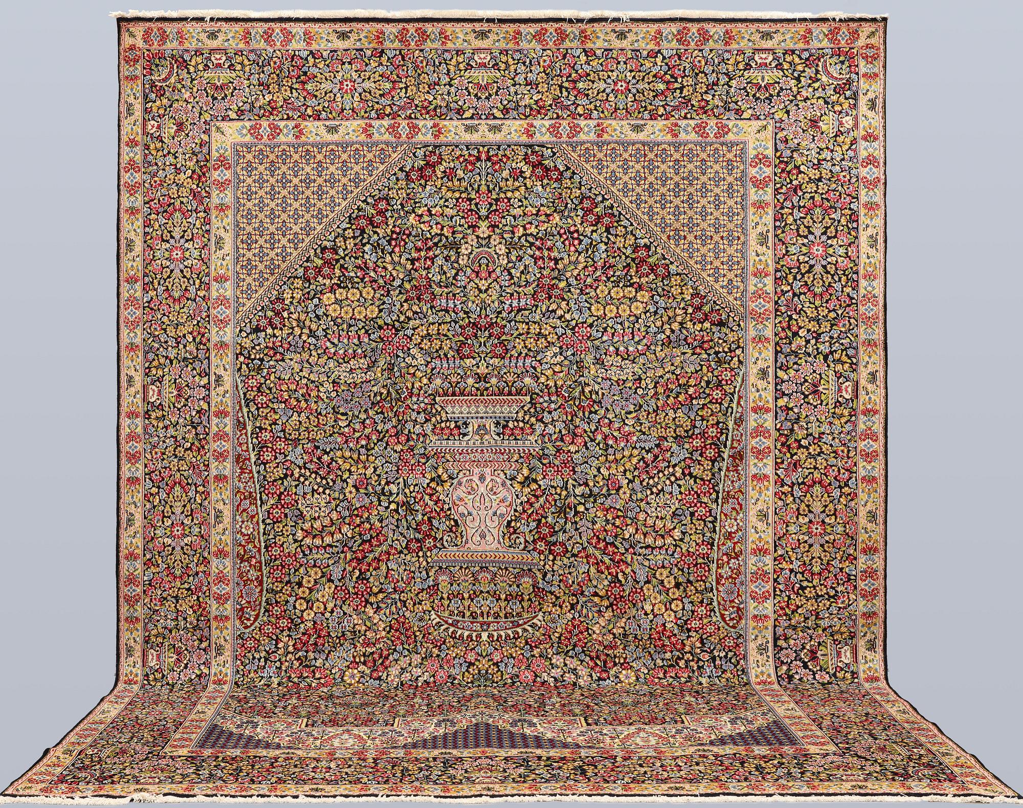 A Kerman Laver carpet, 'Millefleur', c. 392 x 300 cm.