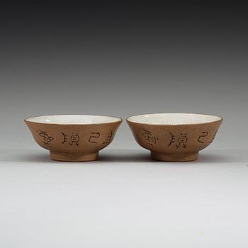 A pair of Chinese ceramic teacups, early 20th Century.