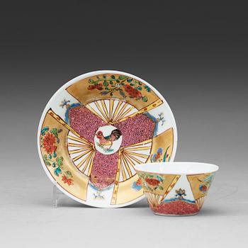 A set of seven odd famille rose cups with saucers, Qing dynasty, Yongzheng (1723-35).