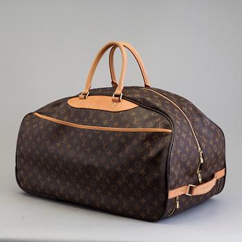 A bag Eole 50 Rolling Carry On, Louis Vuitton.