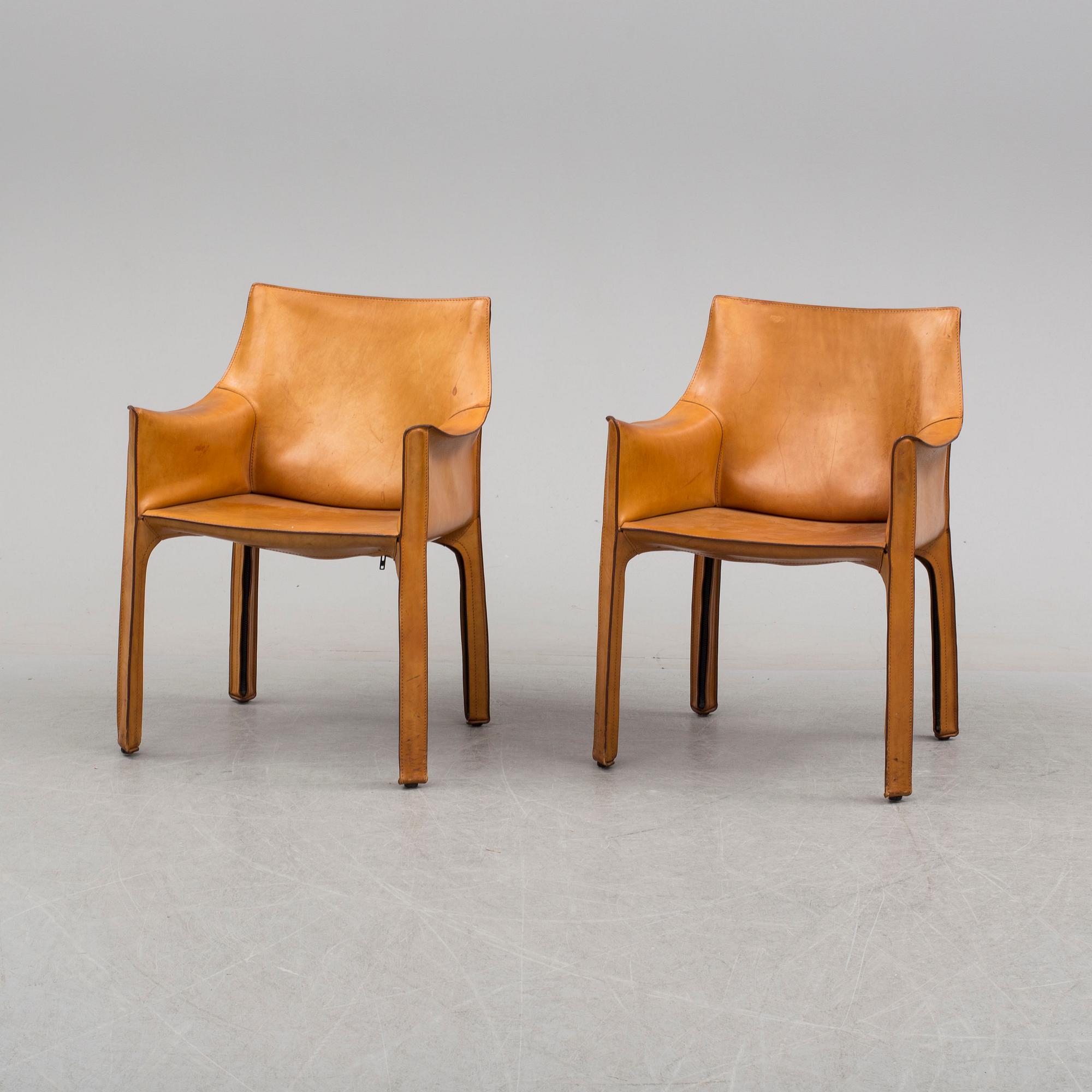 MARIO BELLINI, a pair of "413 CAB" chairs for Cassina.