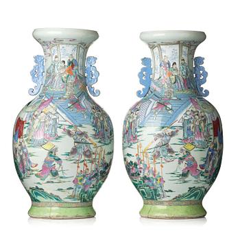 1314. A massive pair of famille rose 'figural' baluster vases, Qing dynasty, 19th century.