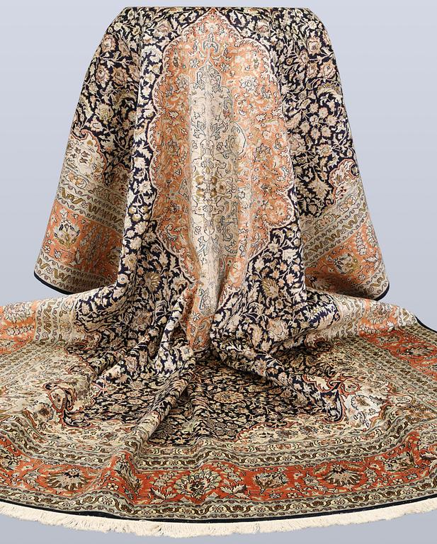 A silk carpet, Kashmir, c. 357 x 274 cm.