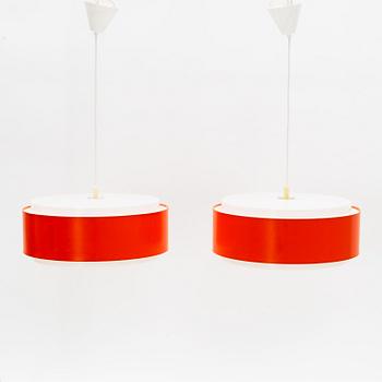 A pair of acrylic 'Cylindrus' ceiling lights, Luxus, Vittsjö.