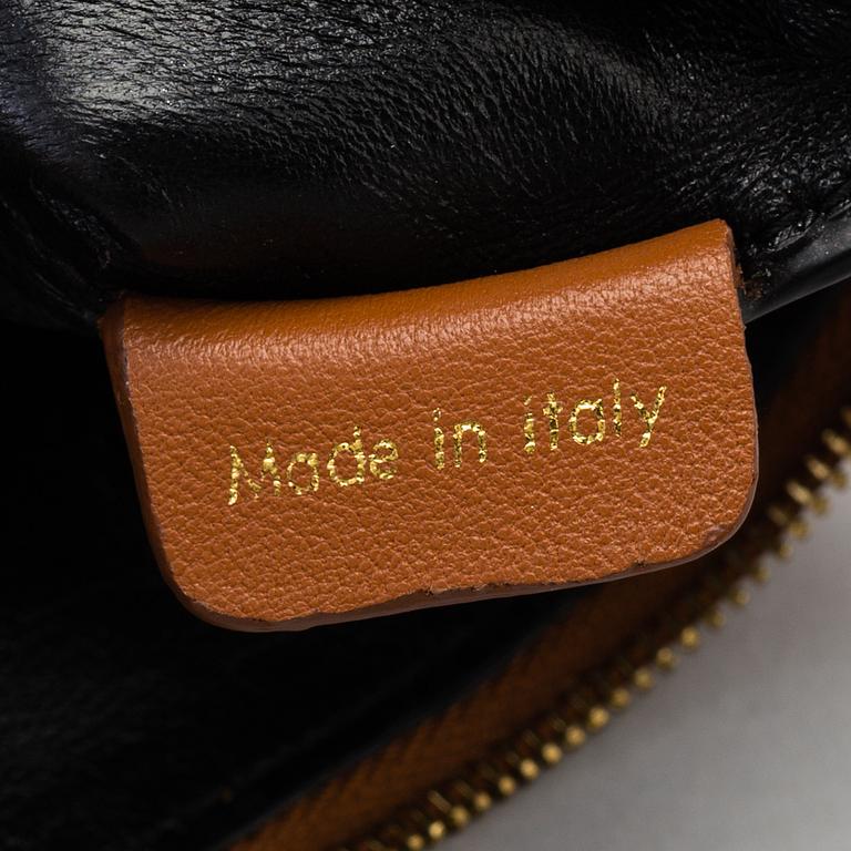 A leather Céline clutch.