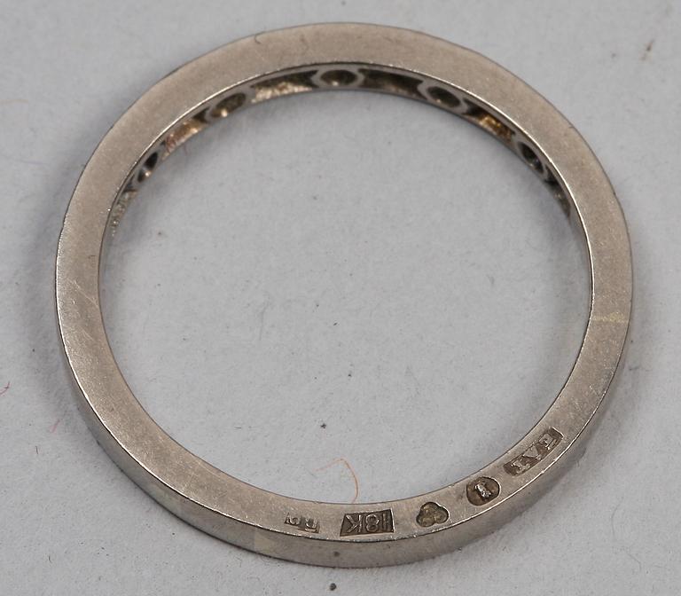 RING, 18 K vitguld och briljanter, 11 st, tot ca 0.55 ct. Erik Thomassons, Stockholm (1954? otydl stmpl).