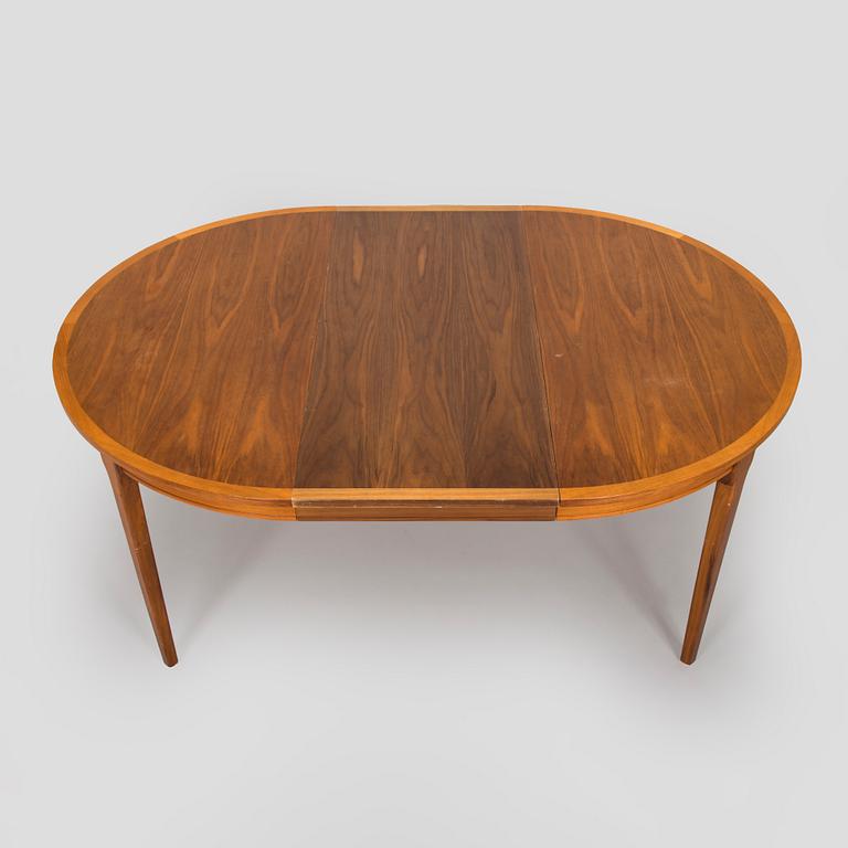 A 1960s teak and oak dining table.