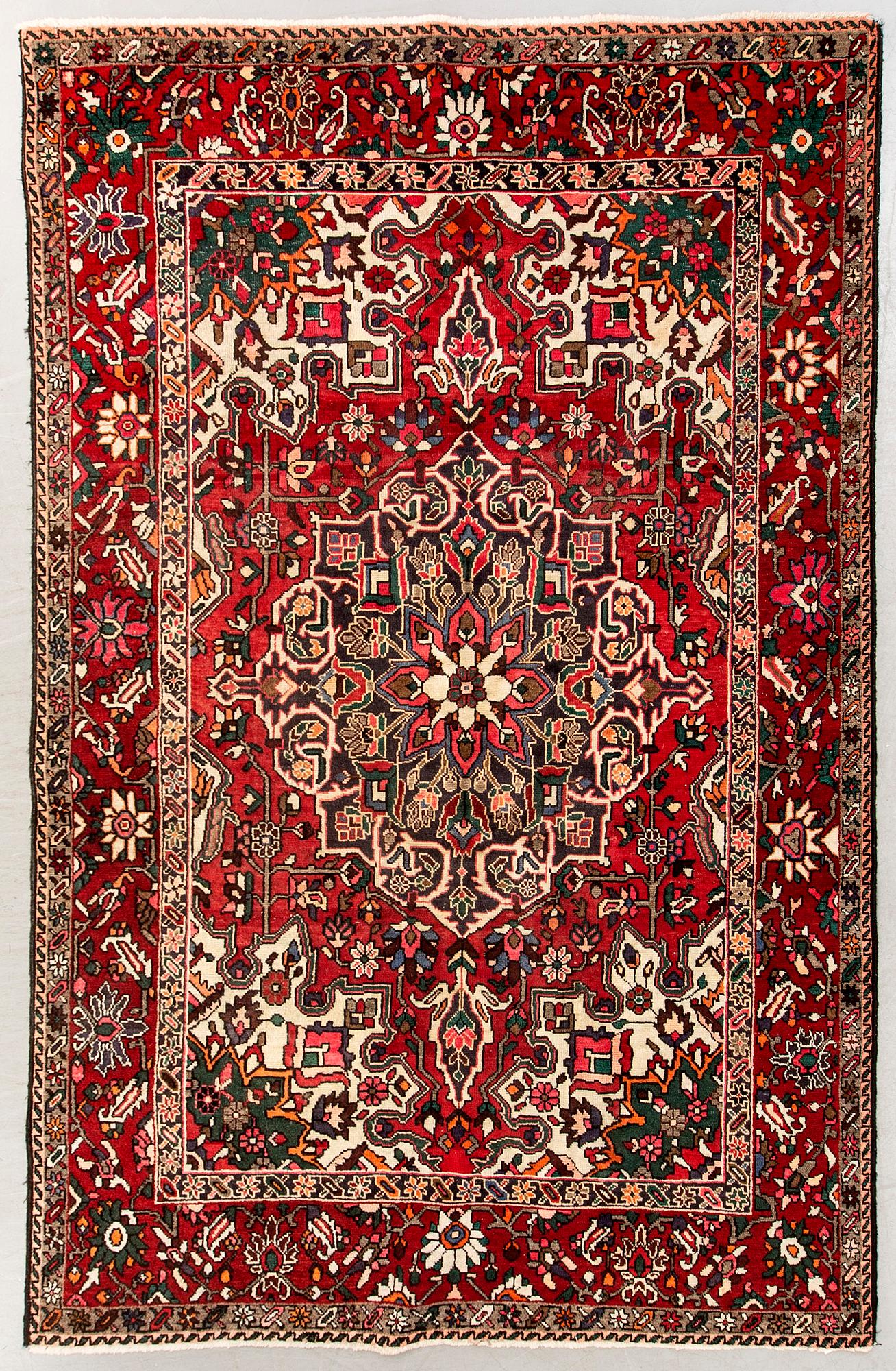 An old bachtiari carpet ca 310x210 cm.