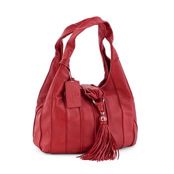 756. LANCEL, a red leather shoulder bag.