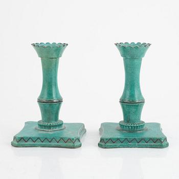 Wilhelm Kåge and Josef Ekberg, ten pieces of green glazed stoneware, Sweden, mid 20th century.