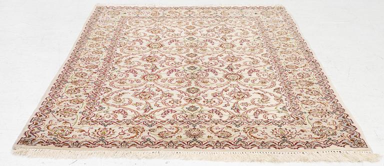 An Isfahan part silk rug, c. 161 x 110 cm.