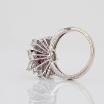 A circa 1.30 ct facetted ruby and marquise- and brilliant-cut diamond ring.