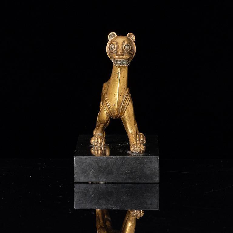 An elegant gilt bronze sculpture of a tiger, Six dynasties, or earlier.