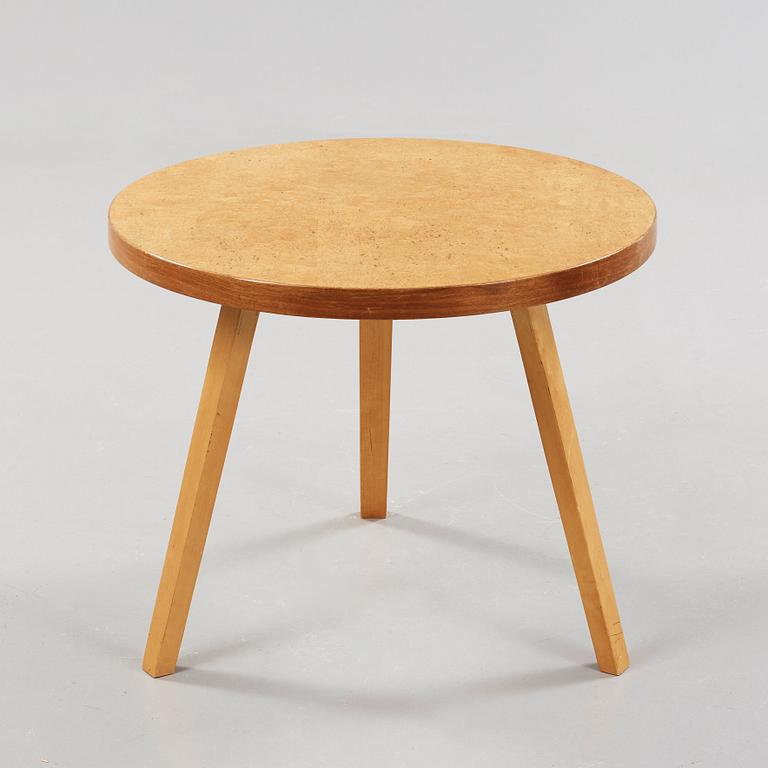 An Alvar Aalto curly birch table, made on license by Aalto Design Hedemora for Artek, Sweden 1946-56.