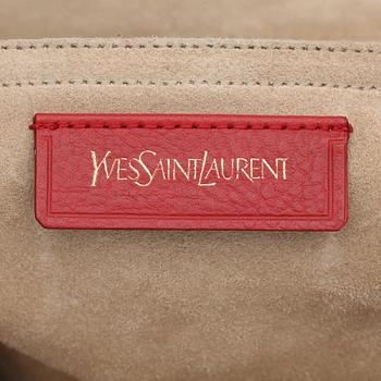 YVES SAINT LAURENT, a beige, red and blue leather handbag, "Muse two".