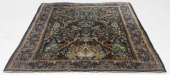 A figural Quum carpet, c. 179 x 125 cm.