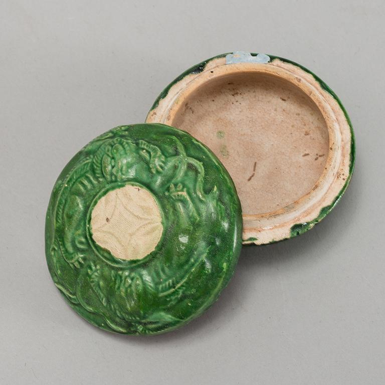 A green and yellow glazed altar garniture and a box with cover, Ming dynasty (1368-1644).