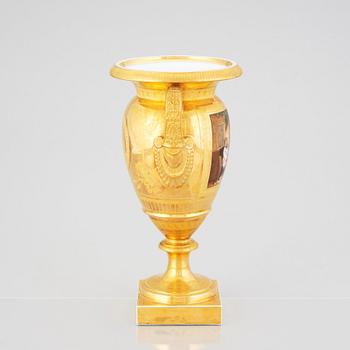 A Ludwigsburg Empire vase, signed C Goll, early 19th Century.