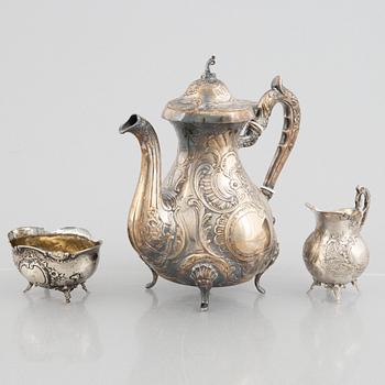 A silver coffee pot, creamer and sugar bowl, including GEWE, Malmö 1973. Rococo style.