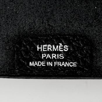 HERMÈS, a black leather notebook, "Moyen Modèle".