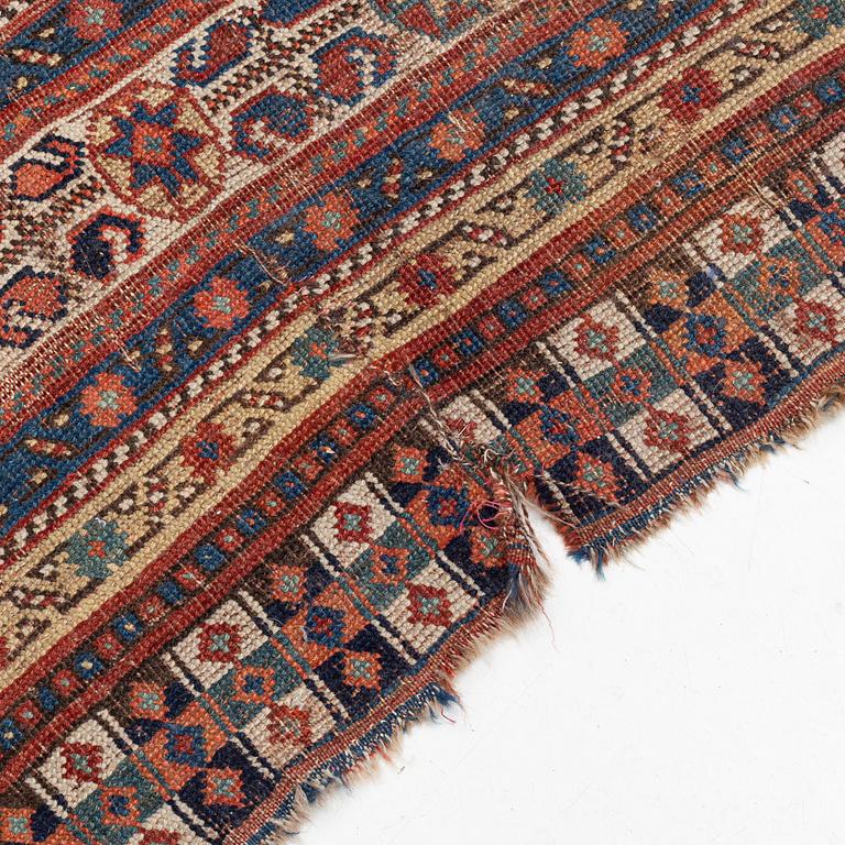 An antique Khamseh carpet, South western Iran, c 352 x 178 cm.