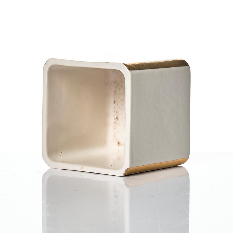 Wilhelm Kåge, 15 pieces of "Carrara" and "Gold Carrara" stoneware dishes, Gustavsberg, Sweden, 1930s/40s.
