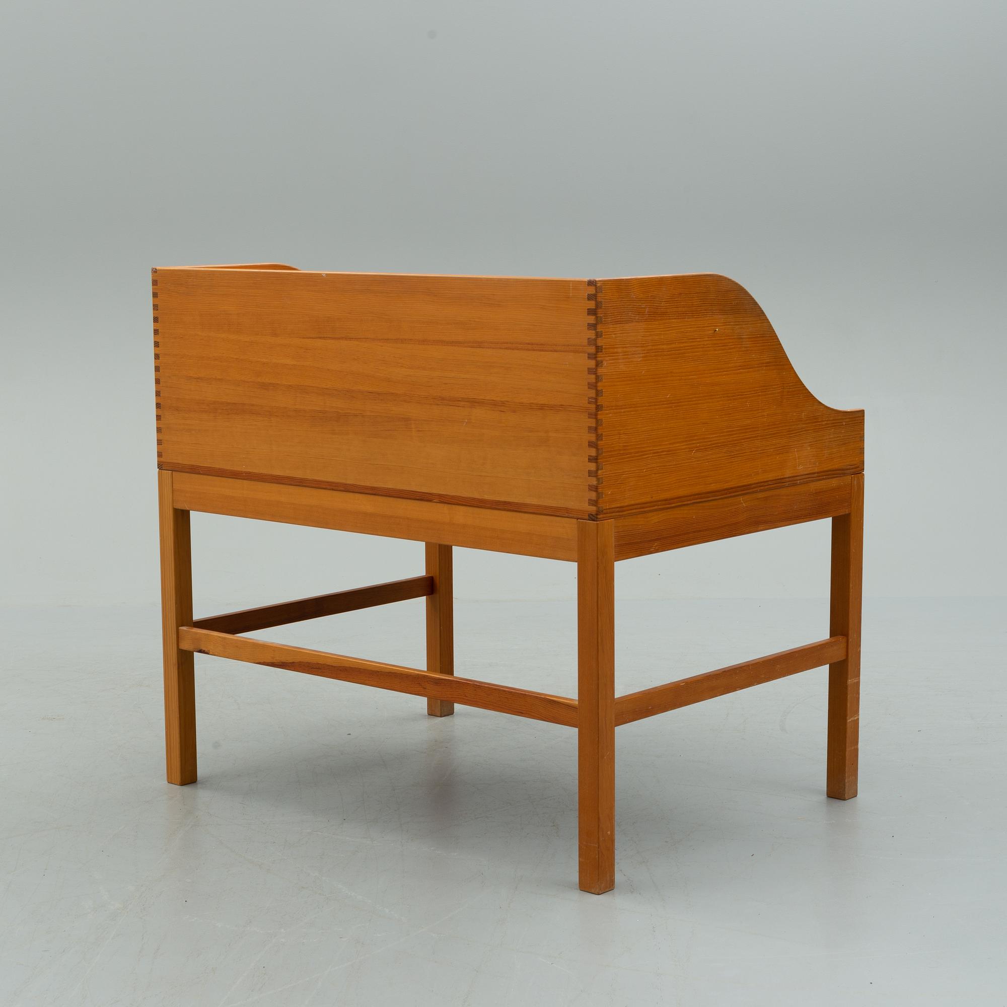 A mid 20th century writing desk by Andreas Hansen for Hadsten Träindustri, Denmark.